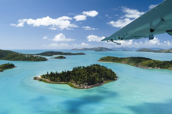 1-Hour Whitsunday Islands and Heart Reef Scenic Flight - Low-level Great Barrier Reef passes: color, depth, and possible marine life