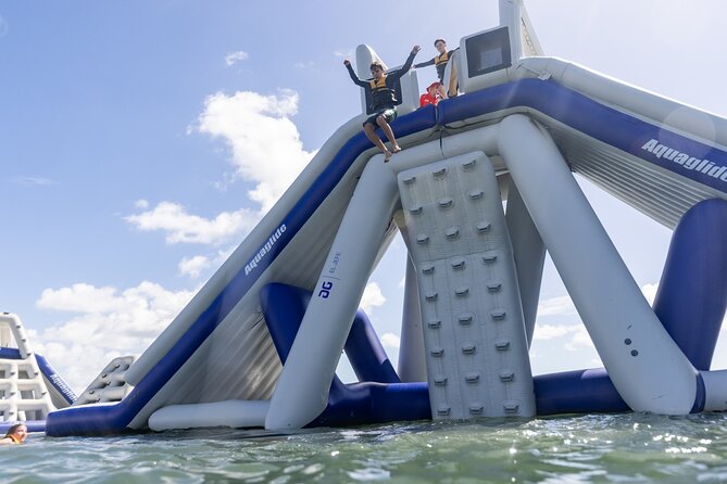 50 Minutes, Southport GC Aqua Park Inflatable Water Activity - Getting ready: waivers and aqua socks are part of the game