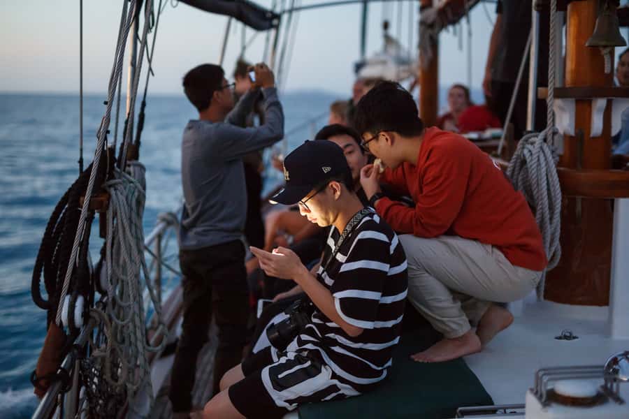 Airlie Beach: Providence Whitsundays Tallship Sunset Sail - Comfort reality: warm clothing, cramped deck, and the barefoot rule