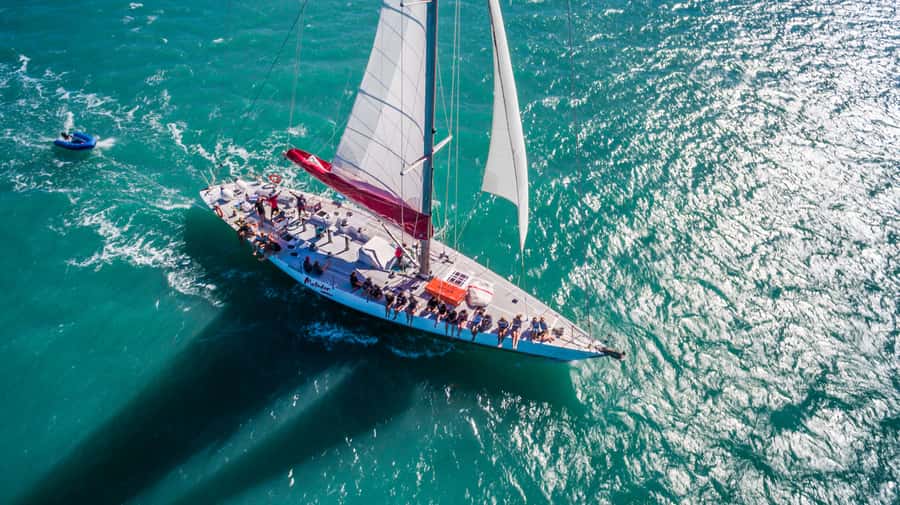 Airlie Beach: Whitsunday Islands 2-Day Sailing Tour - Meeting the Matador: Coral Sea Marina, South Village, and timing