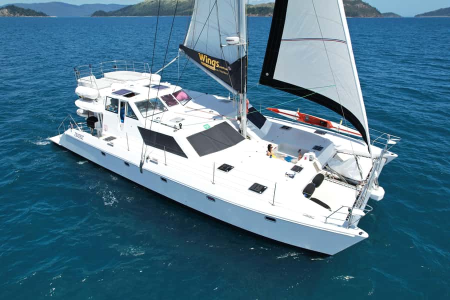 Airlie Beach: Whitsunday Islands Sailing, SUP & Snorkel Tour - A 6-hour Whitsundays catamaran day that balances sailing and real play