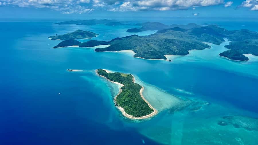 Airlie Beach: Whitsundays & Great Barrier Reef Scenic Flight - From Airlie Beach to the Sky: transfer that keeps things low-stress