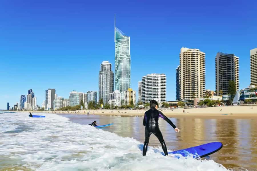 Broadbeach: 2 Hour Surf Experience on the Gold Coast - Rash Shirt, Wetsuit, and a Soft-Top Board: Why Beginners Feel Safer