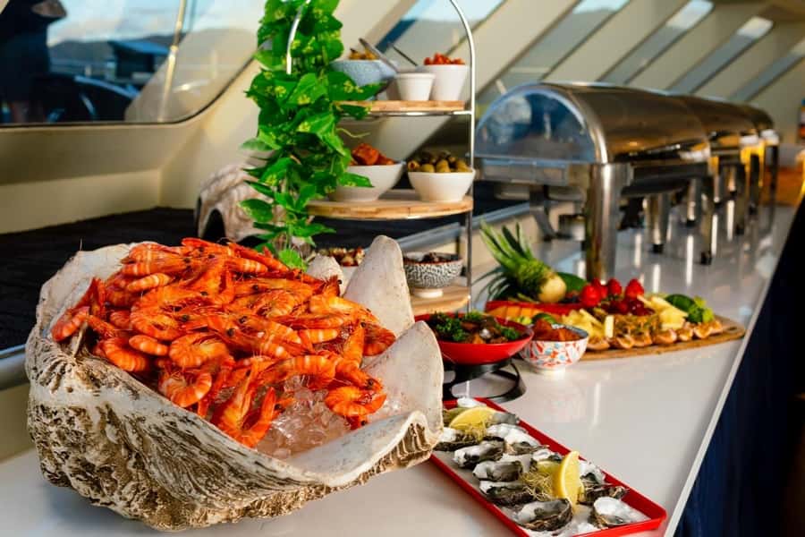 Cairns: Spirit of Cairns Dinner Cruise - The cruise rhythm: welcome drink, scenic cruising, then dinner time