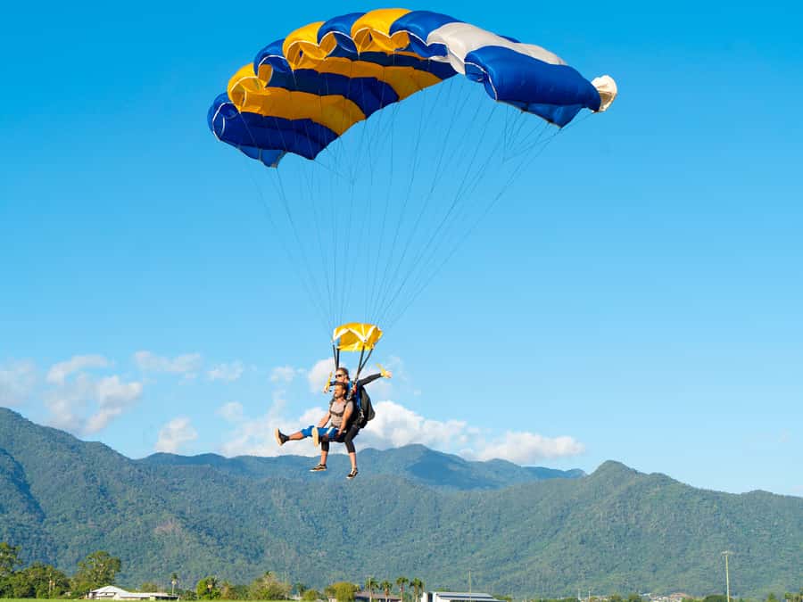Cairns: Tandem Skydive Experience - Up to 15,000 feet, speed you can feel, and the timing of freefall