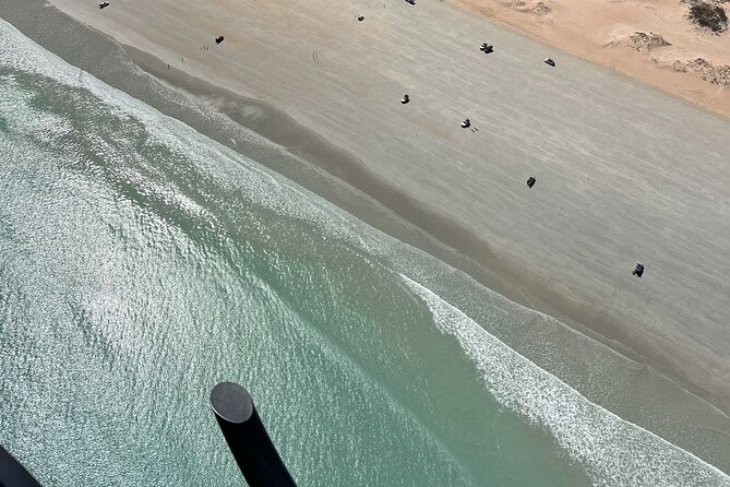 Colours of Broome: Stunning 30-Minute Scenic Helicopter Flight - Gantheaume Point, red Pindan cliffs, and turquoise water