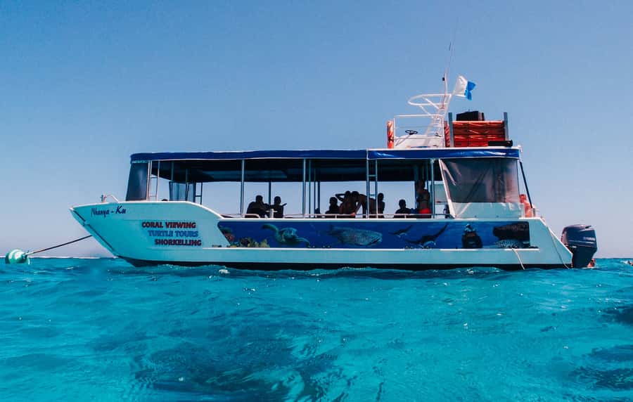 Coral Bay Glass-Bottom Boat Tour - From Robinson St to the beach: the one logistics detail that matters