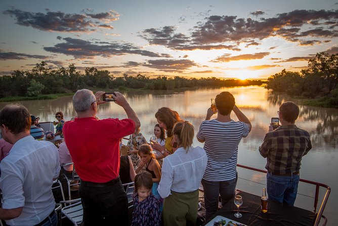 Drover's Sunset Cruise includes Smithy's Outback Dinner and Show - Longreach at golden hour, with the Thompson River doing the talking