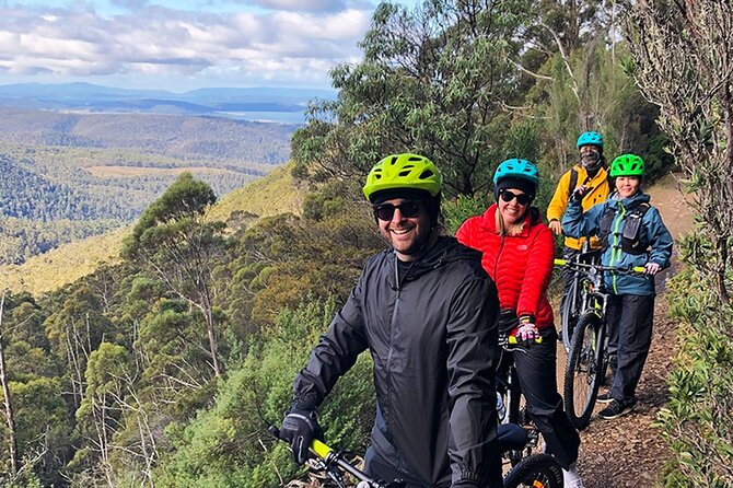 Easy Bike Tour - Mt Wellington Summit Descent & Rainforest Ride - What to wear for summit wind: layers are the whole game