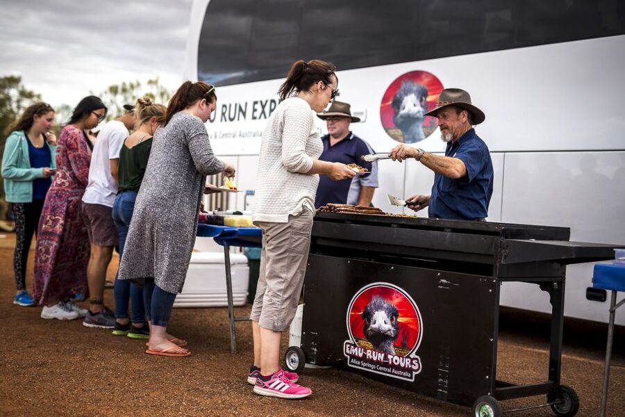 From Ayers Rock Resort: Uluru Sunset Barbecue Dinner - Getting there in air-conditioned comfort from Ayers Rock Resort