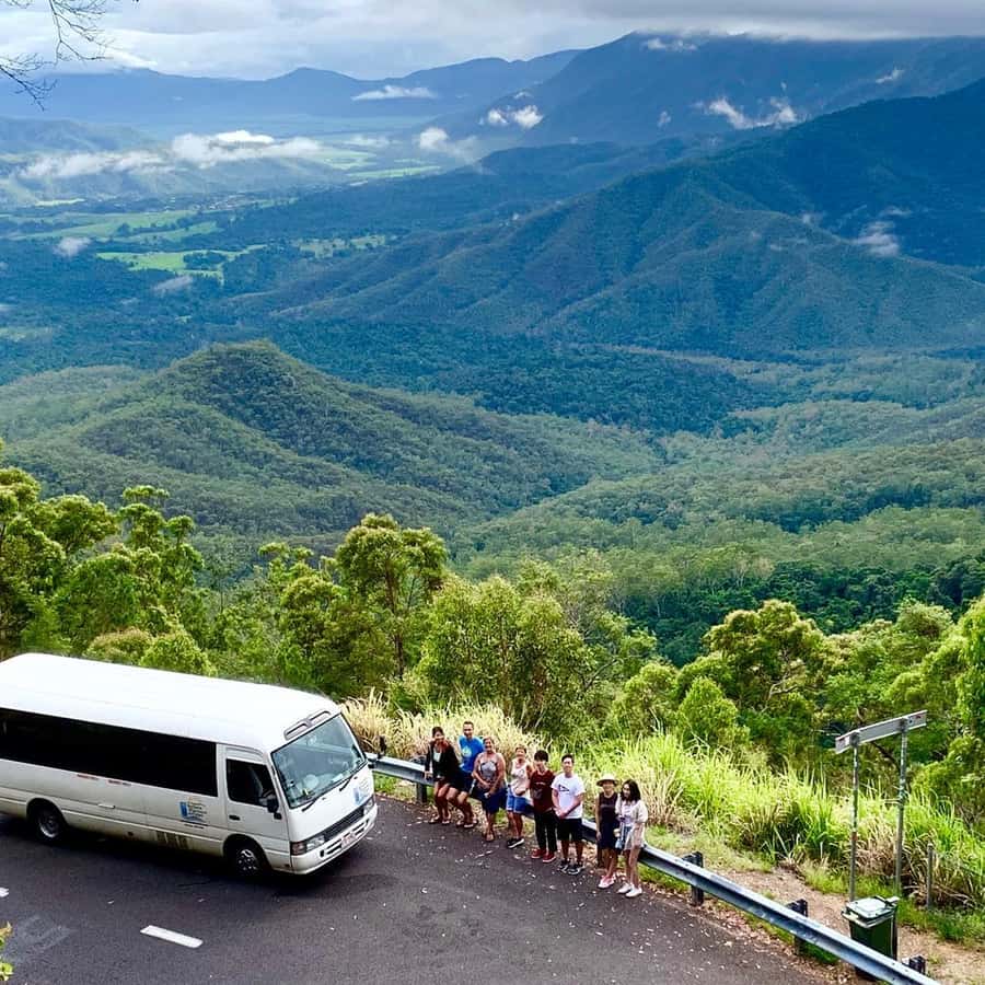 From Cairns: Atherton Tablelands and Paronella Park Day Trip - Malanda and Millaa Millaa Falls: swim time with volcanic water