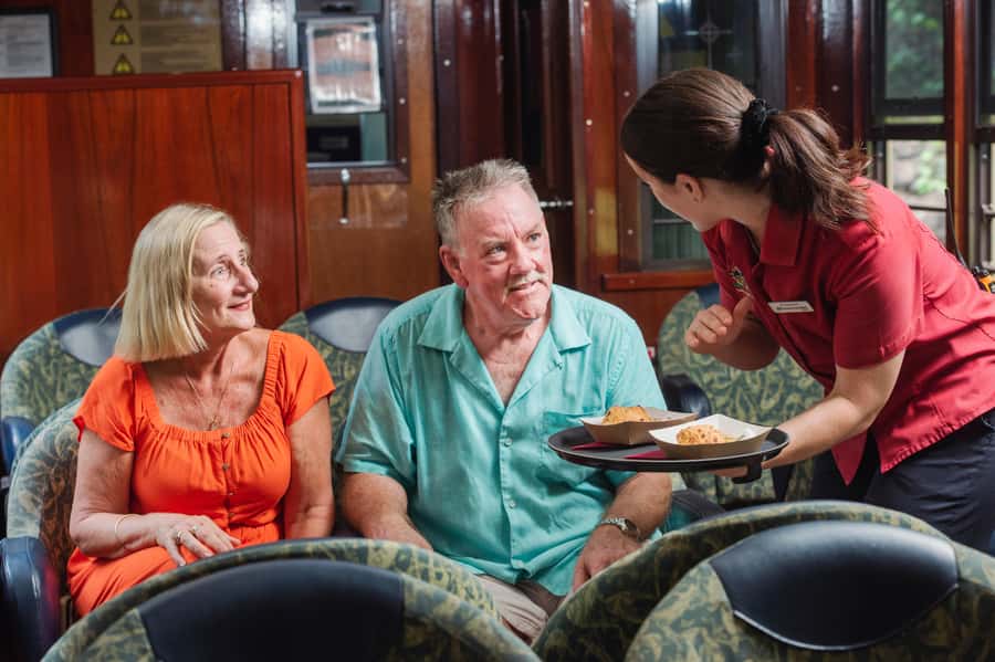 From Port Douglas: Kuranda via Scenic Rail or Skyrail Option - Kuranda free time: markets, snacks, and how to use your 2 hours