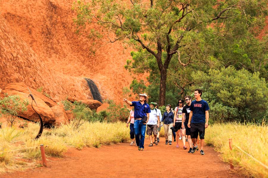 From Yulara: Uluru Tour and Sunset BBQ - Mutitjulu to sunset viewing: why night changes the rock