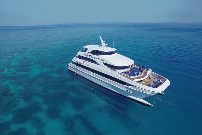 Full Day Reef Cruise and 10 Minute Helicopter Scenic Flight - First Reef Stop, Norman or Saxon Reef: Snorkel and Optional Scuba Session