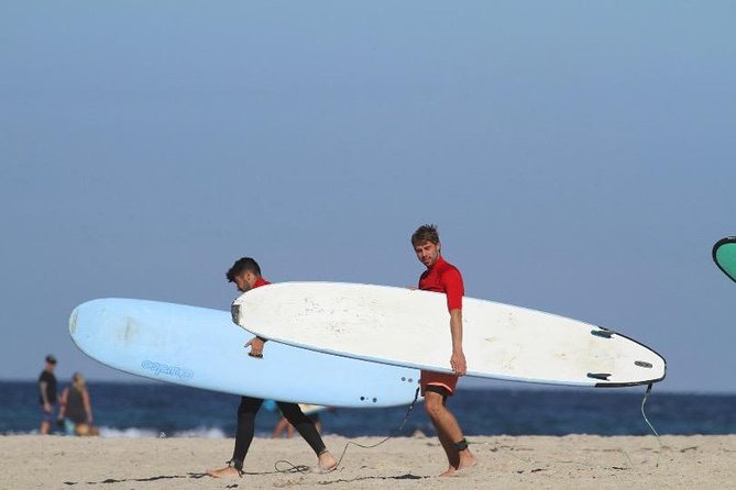 Group Surfing Lessons Kool Katz 1 day - Gear included, towel required: pack smart