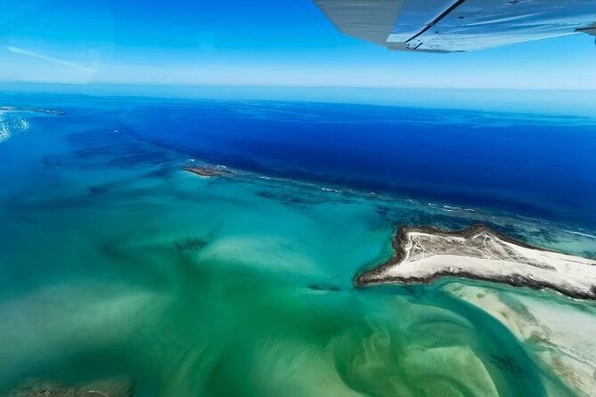 Incredible Islands Tour - Horizontal Falls & Cygnet Bay Pearl Farm - Cape Leveque: beach time, swimming, and red-cliff photos