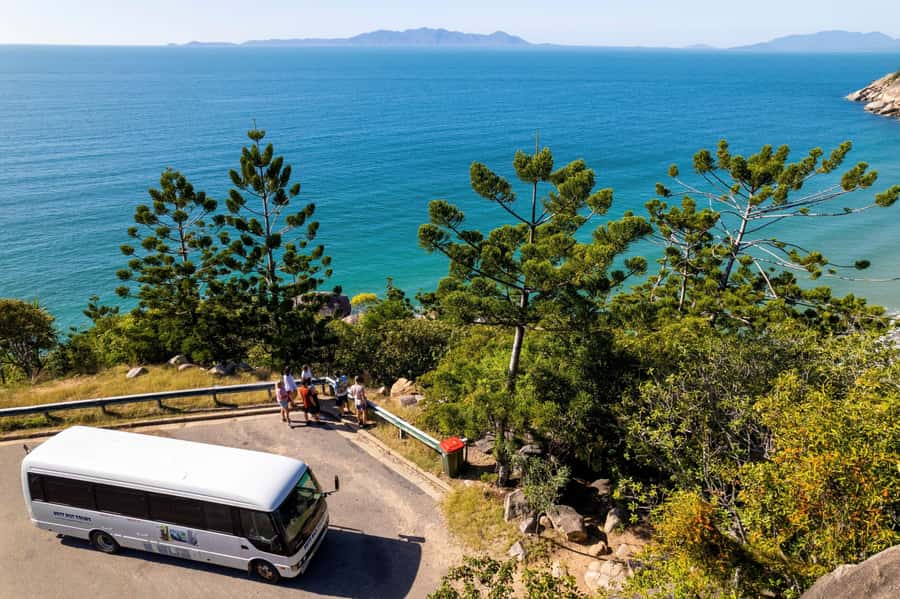 Magnetic Island: Guided Bus Tour with Morning Tea - Picnic Bay foreshore, morning tea, and a jetty-style break