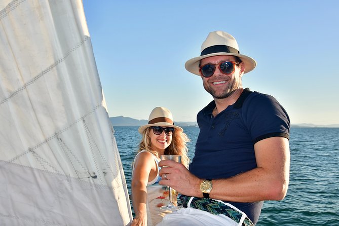 Magnetic Island Sip and Sail Sunset Cruise - The food and drink moment: cheese platter, pumpkin chutney, and easy pairing