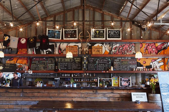Margaret River Small-Group Full-Day Wine & Food Tour - Stop 3: Thompson Estate and barrels as the backdrop