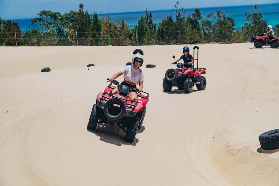 Moreton Island: Tangalooma Day Trip with ATV Quad Bike Tour - Tangalooma Resort Day Pass: Pools, Lockers, and a True Base on the Island