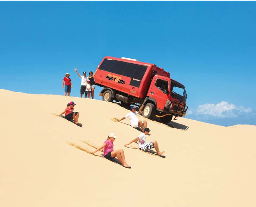 Port Stephens: Birubi Beach 4WD Tour with Sandboarding - Birubi Beach pipi hunting: part nature lesson, part treasure hunt
