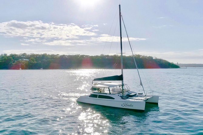 Private Catamaran Hire on Sydney Harbour - The quiet cove anchor stop: views, space, and time to settle in