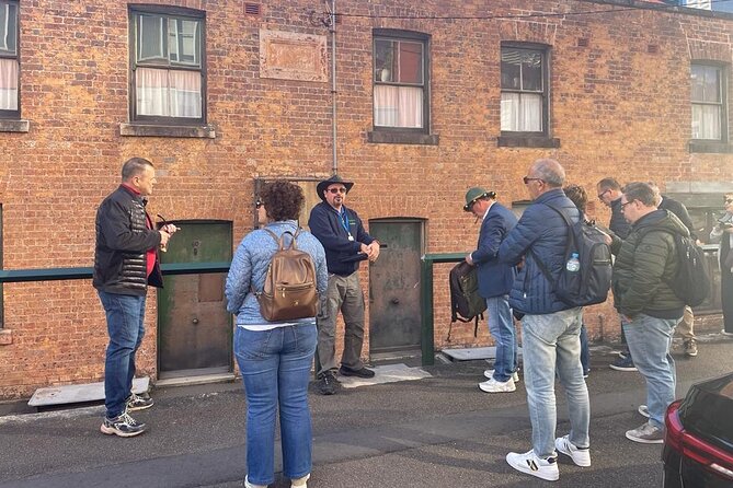 Private Full Day Sydney Highlights Tour - Kings Cross and the Coca-Cola sign: a fun contrast
