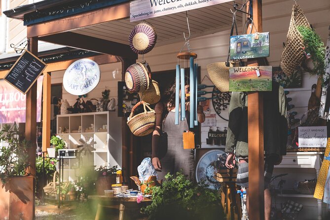 Sunshine Coast Hinterland and Noosa Day Trip from Brisbane Incl Eumundi Markets - Noosa Heads: beach time, town strolling, and a National Park edge