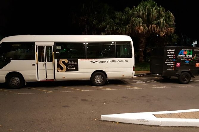 Sydney Airport to Sydney CBD shared ride seat in vehicle shuttle transfer - Inside the shuttle: air-conditioning and real luggage handling