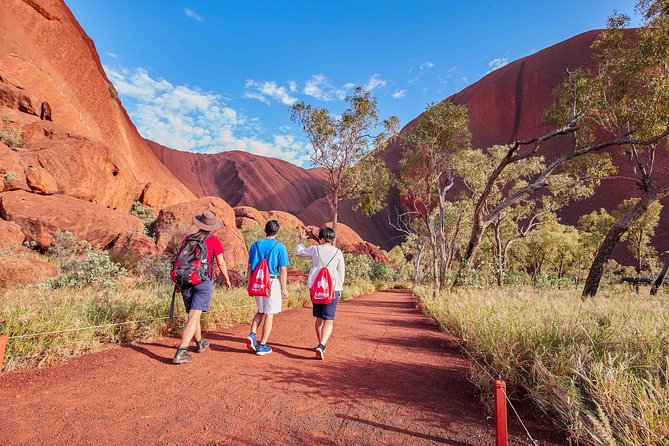 Uluru (Ayers Rock) Base and Sunset Half-Day Trip with Opt Outback BBQ Dinner - Kuniya Walk to Mutitjulu Waterhole, short but meaningful
