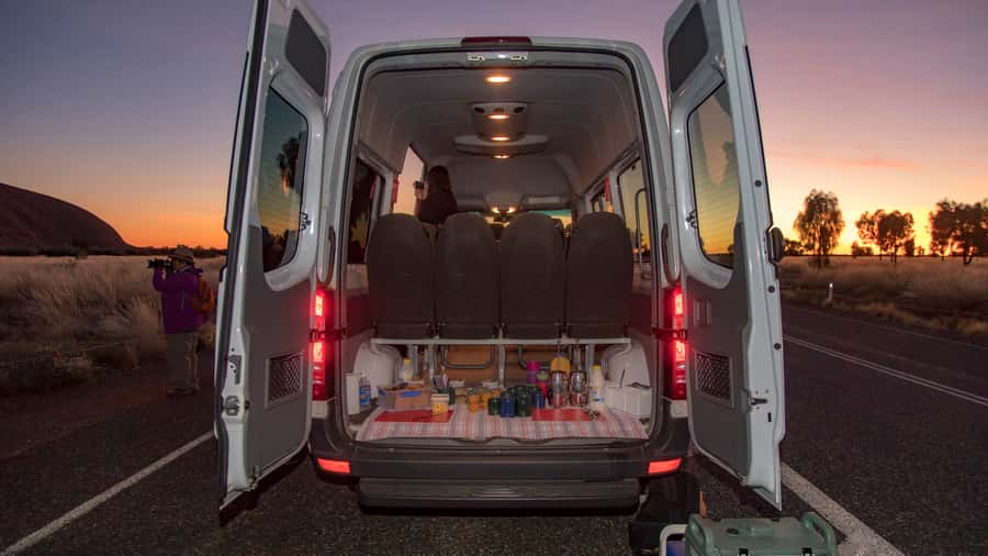 Uluru Highlights Small Group Morning Tour + Picnic Breakfast - Pickup, group size, and audio guides that help