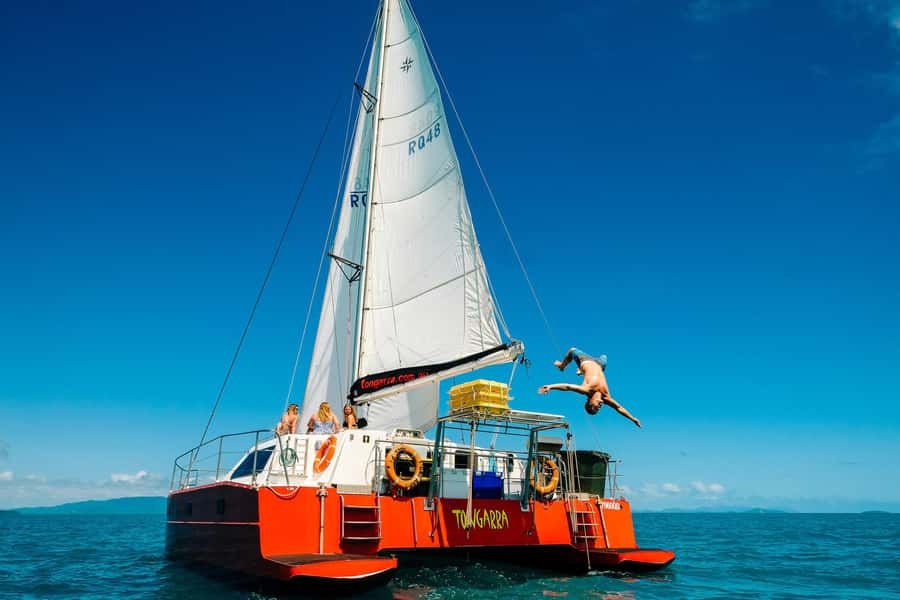 Whitsundays Sailing & Snorkelling Day Tour – All Inclusive - Return sail to Airlie Beach: snacks, tunes, and sunset timing